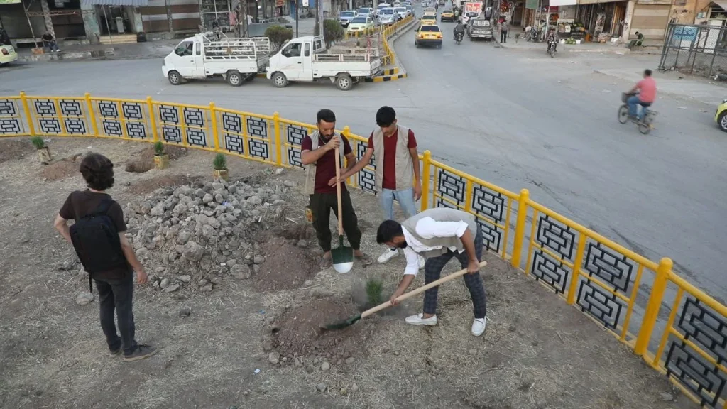 Volunteers preparing an urban planting area